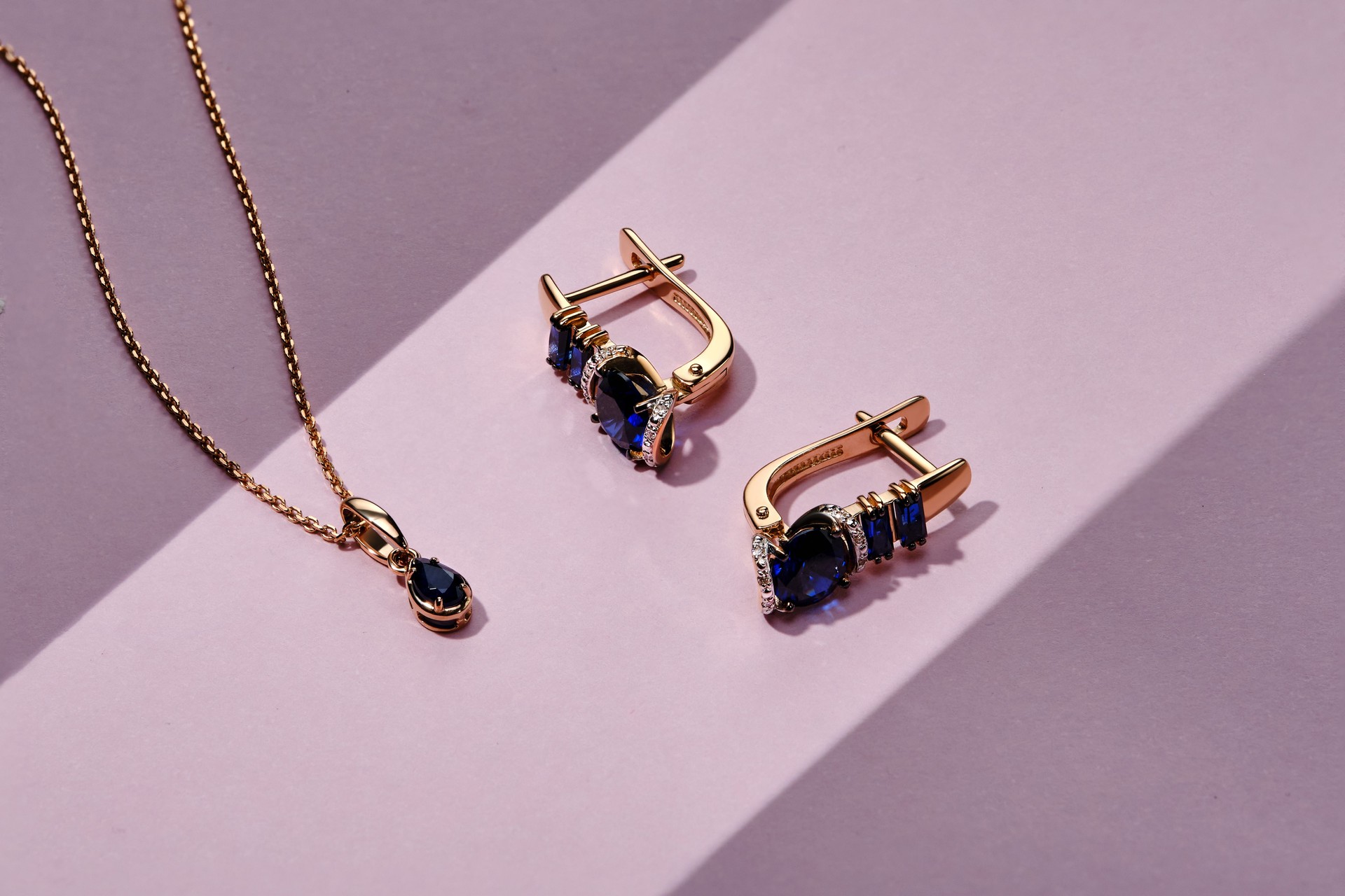 Elegant jewelry set. Jewellery set with gemstones. Jewelry accessories collage. Product still life concept. Ring, necklace and earrings.